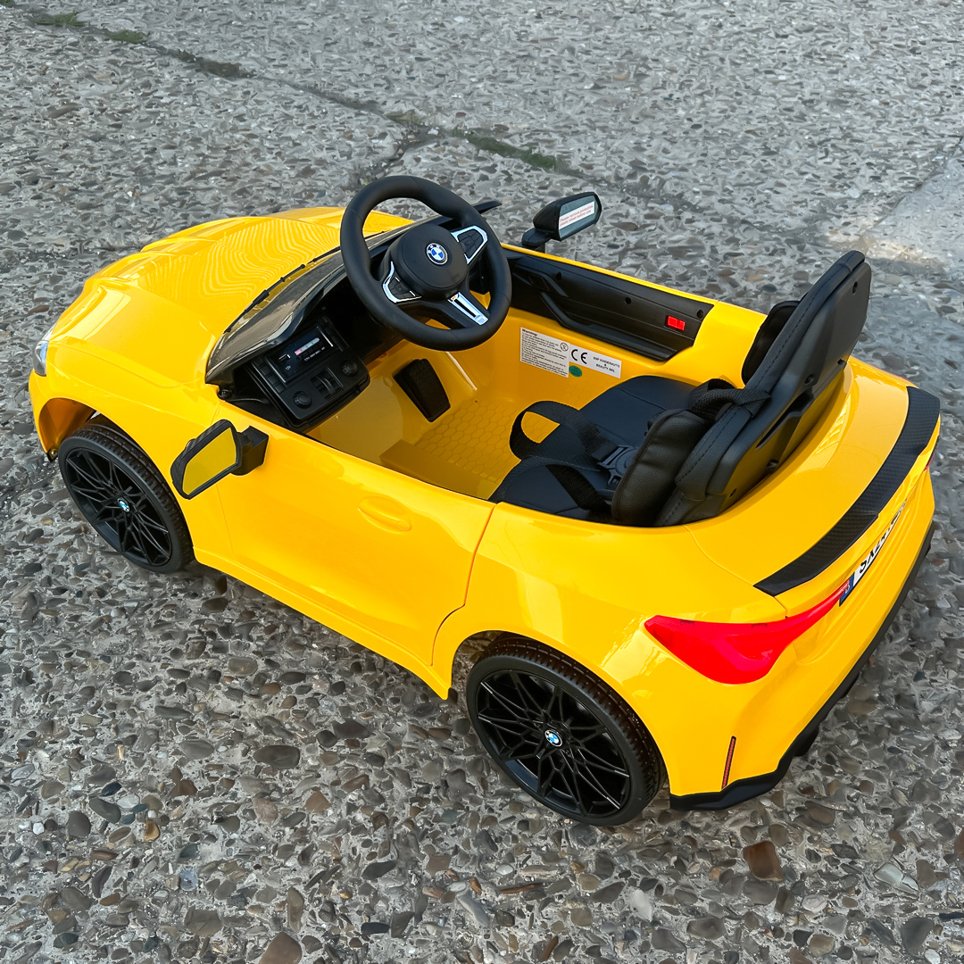 masinuta-electrica-pentru-copii-bmw-m4-90w-putere-baterie-12v-7ah-roti-eva-scaun-tapitat-galben-749723