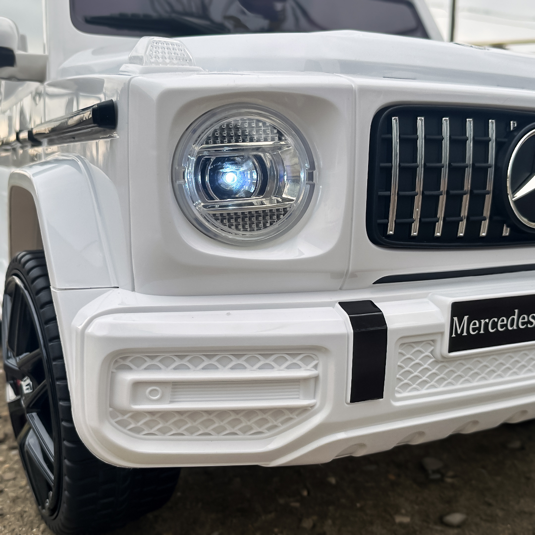 masinuta-electrica-pentru-copii-mercedes-g63-amg-70w-12v-echipare-premium-alba-343590